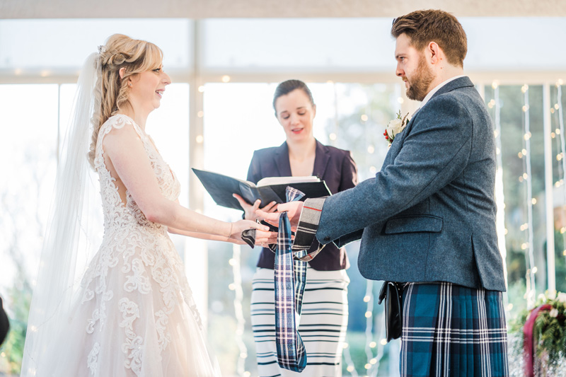 Bride and Groom perform Hand Fastening Humanist Ceremony at Carlowrie Castle Edinburgh