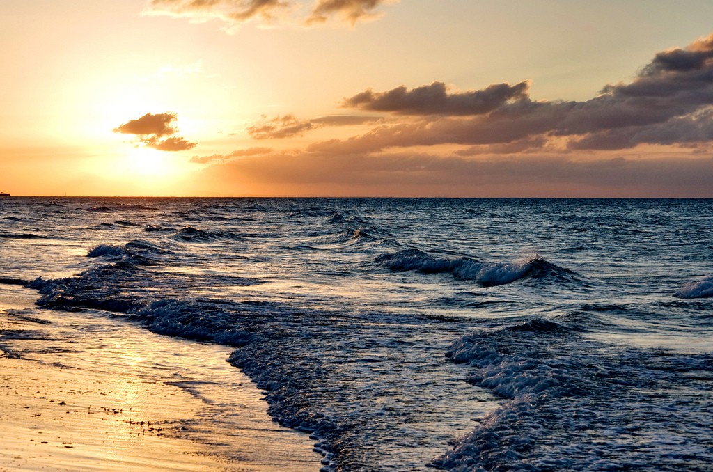 sunset at beach with waves