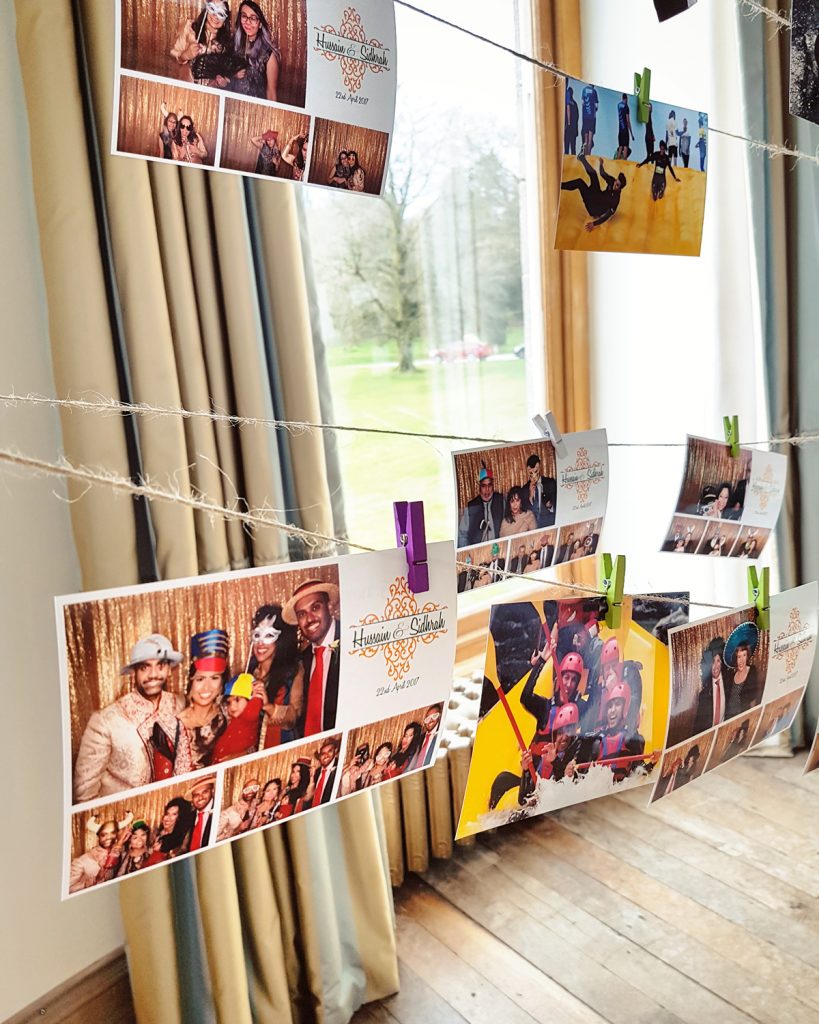 wedding photo booth prints pegged on washing line wedding guest book alternative idea