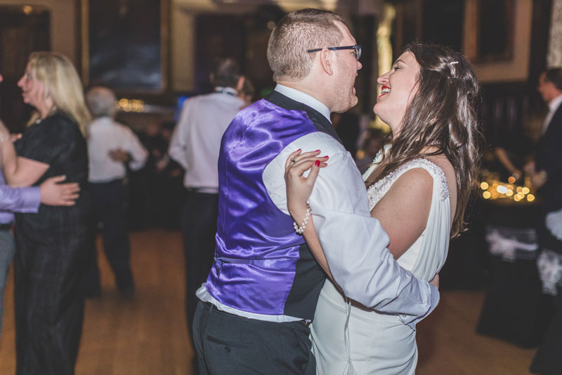 Bride & Groom embrace at Trades Hall of Glasgow Wedding