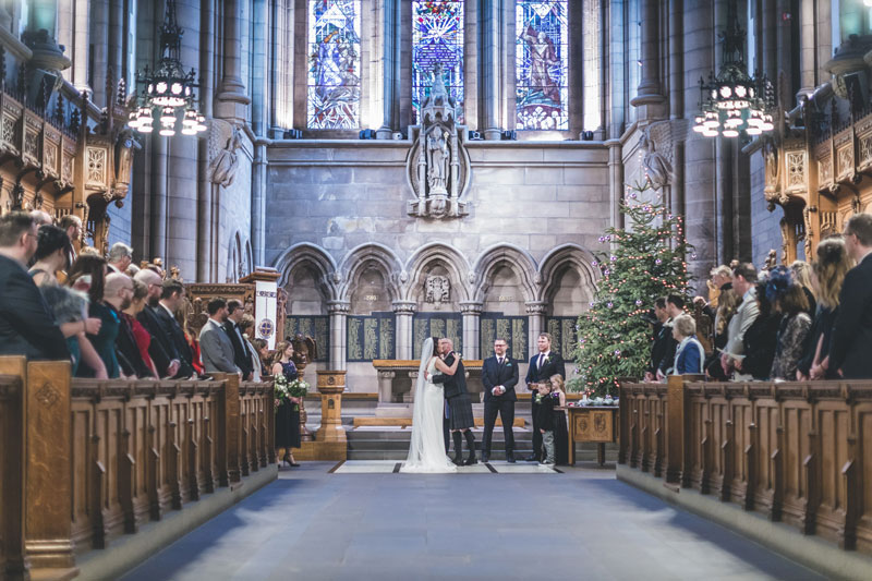 Phillipa Hugs Dad before the wedding ceremony at Glasgow University Memorial Chapel