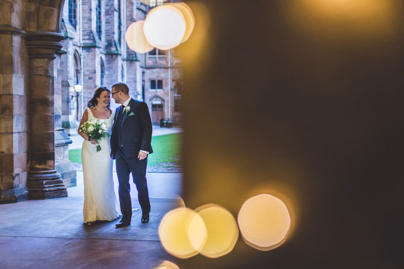 Philippa & Kristian standing outside Glasgow University Memorial Chapel