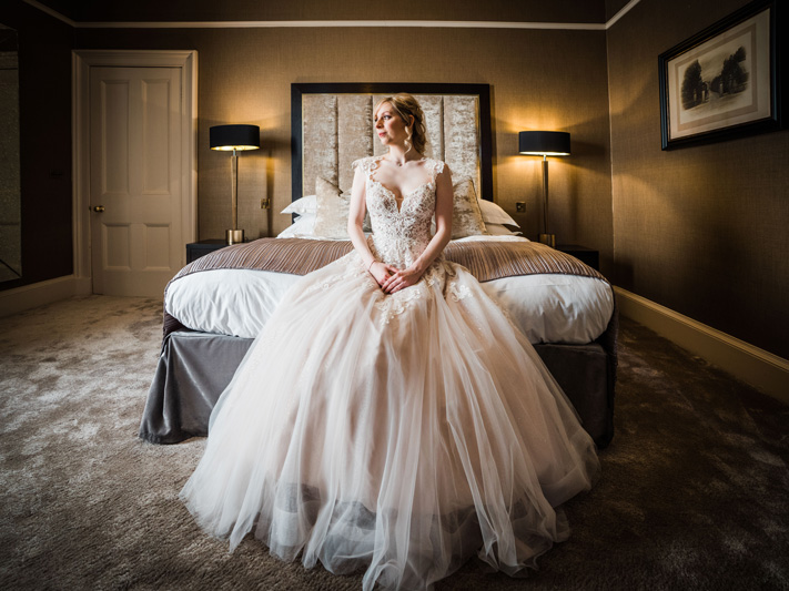 Bride in wedding dress Carlowrie Castle