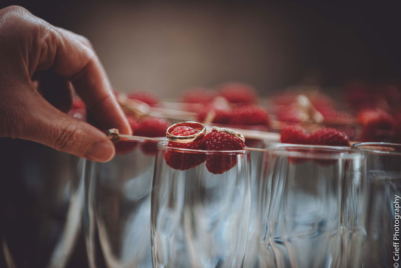 wedding rings on raspberries at Comrie Croft