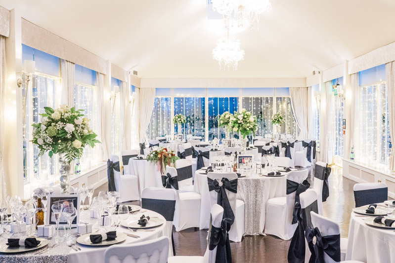 White and Silver wedding decor tables Carlowrie Castle