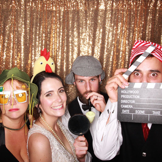 Guests using photo booth at Auchen Castle Wedding Beattock