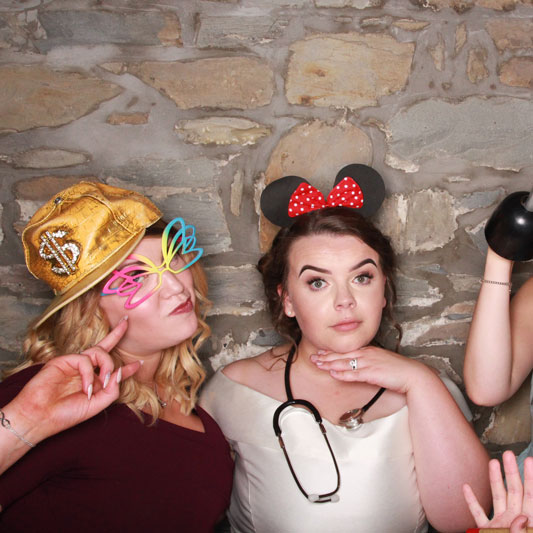 Bride Using the photo booth at GG's Yard Wedding